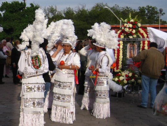 Matachines wearing traditional dance costumes
