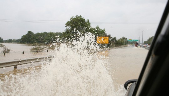 Flooded road close to the Thailand border.